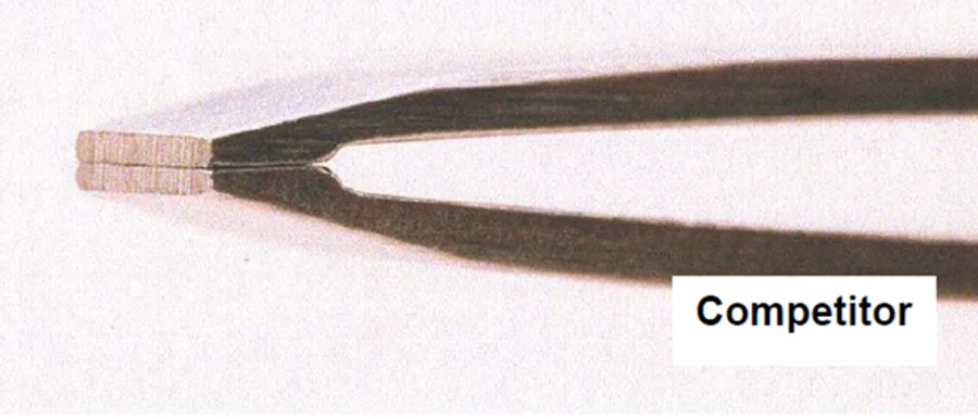 Macro photo of a competitor tweezer tip with a gap